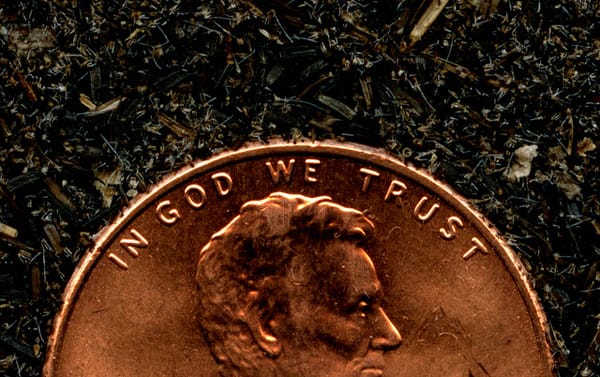 The Penny says, "In God we Trust"
