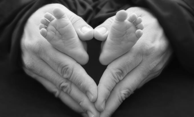 Daddy hands baby